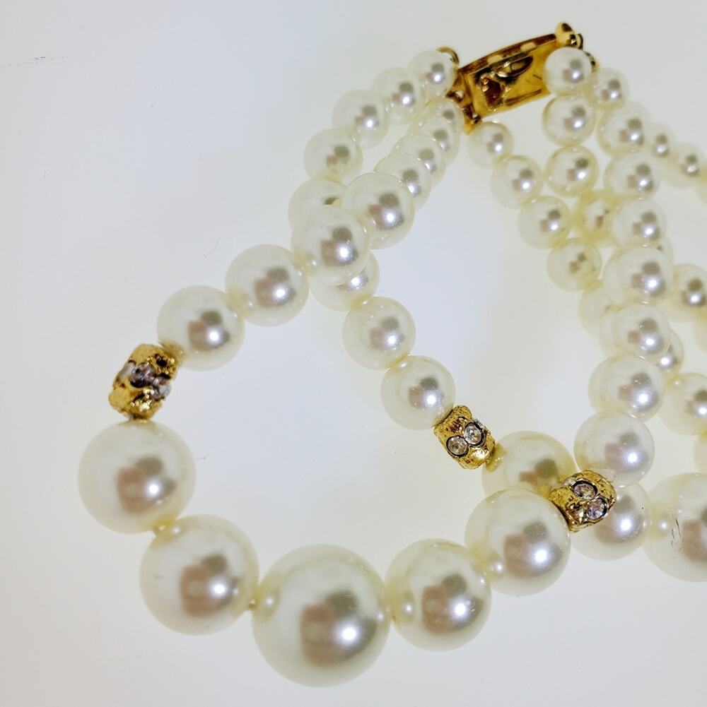 Faux pearl bracelet Three strands with gold accents Marked AFJ Taiwan